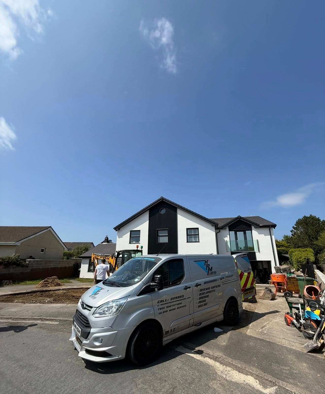 HPM fleet vehicle on a resin driveway